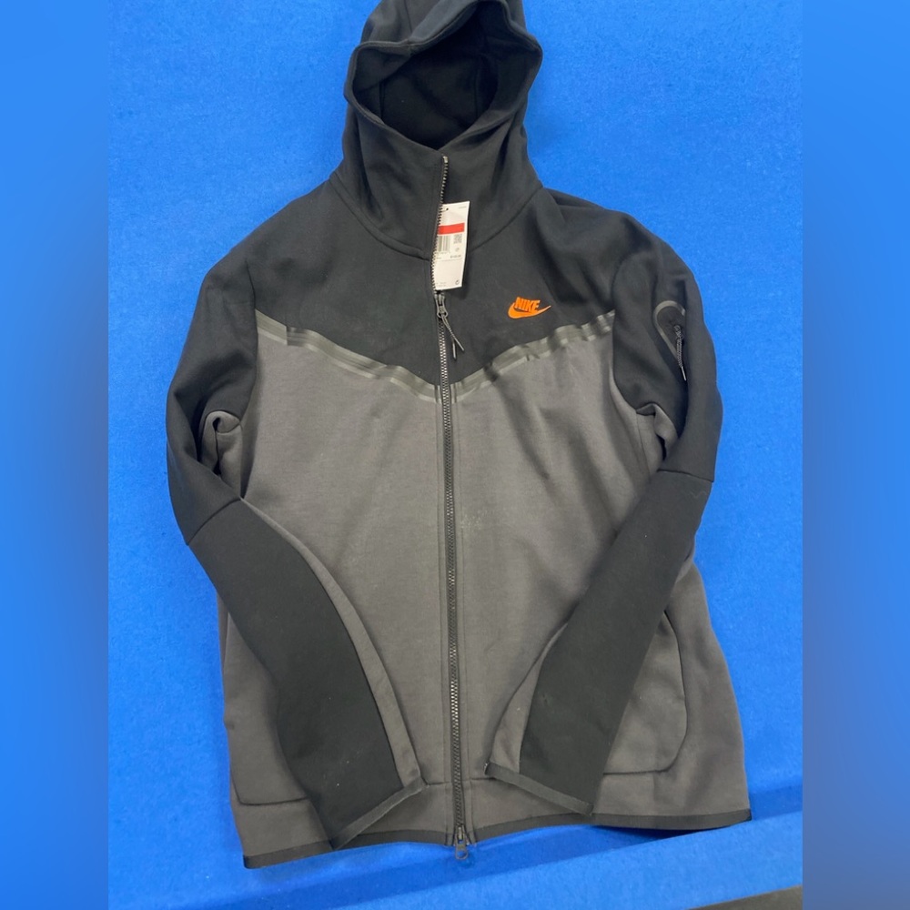 Nike mens grey and black sportswear hoodie.